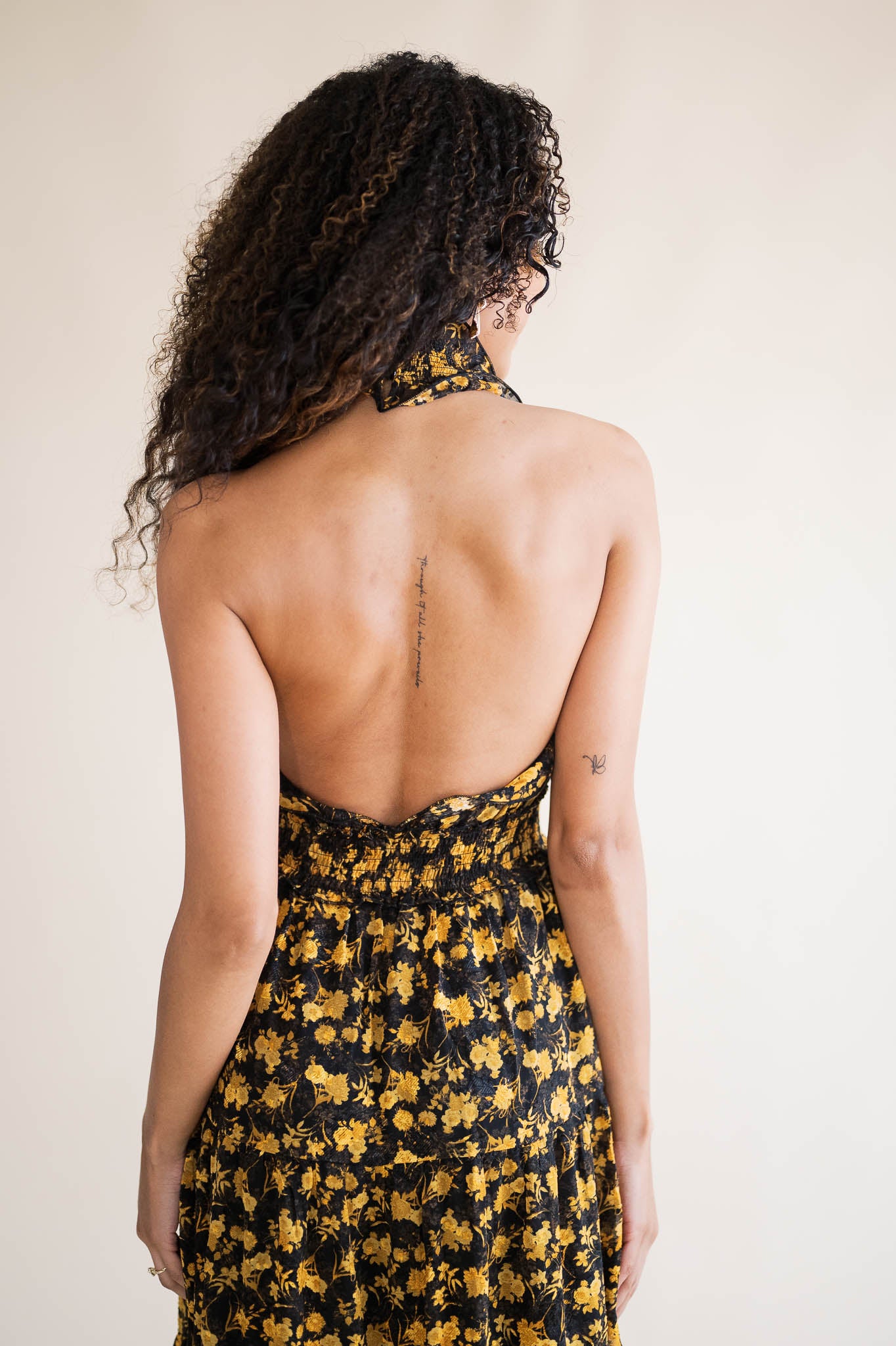 Black and gold online halter neck dress